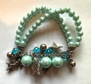 Hellblaues Bettelarmband mit Doppelkette Meermotiv eine Freude zu haben - Bild 1 von 2