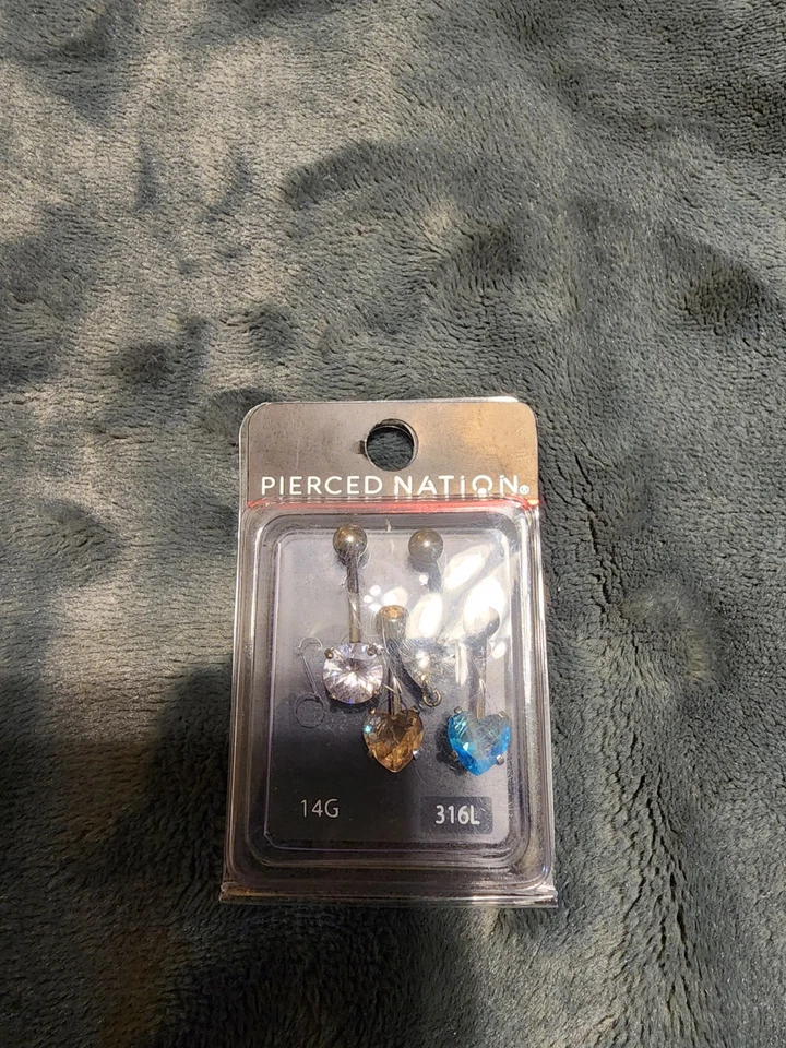 Piercings en el corazón del vientre de acero quirúrgico Spencer's Pierced Nation 14G 316L faltan 1 Foto 1 de 1