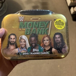 2019 Topps WWE Wrestling MONEY in the BANK Sealed MINI-BRIEFCASE TIN-AUTO/RELIC - Picture 1 of 4