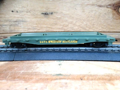Tyco HO 40' Western Maryland 2475 Railroad Train Flat Car with Pipe Carriage - Image 1 of 4
