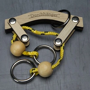 Durchhänger (Sagging) - Ring and Rope Puzzle - Level 6 - Siebenstein Spiele - Picture 1 of 2