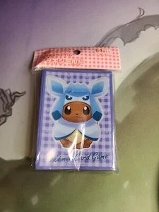 Pokemon Eevee Poncho Glaceon Manicotto Pokemon Center NUOVO 64 pezzi Pokemon 2017 - Foto 1 di 2