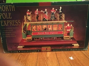 Tren de tranvía expreso estilo Enesco Maisto polo norte multiacción/lites musical - Imagen 1 de 12