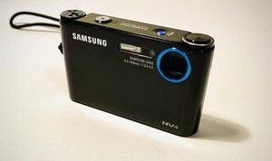 Samsung NV4 Ultracompact Digital Camera - 8.2 MP, high specs, Portable media, GC - Picture 1 of 10
