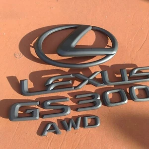 LEXUS BLACK GS 300 AWD LETTERING EMBLEMS WITH LOGO OEM USED - Foto 1 di 6