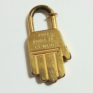 HERMES Cadenas 2002 Schlüsselanhänger Taschenanhänger Handmotiv Unisex Gold Nr 250925 - Bild 1 von 6