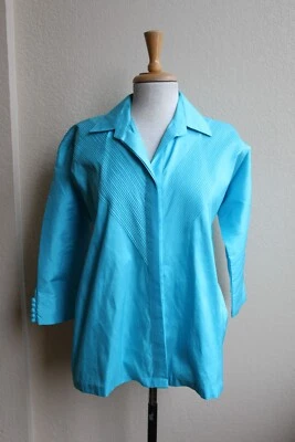 Blusa de seda tailandesa azul aguamarina vintage años 80 con costuras diagonales y mangas Dolman Foto 1 de 2