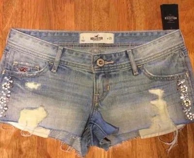 Mini Pantalones Cortos Vaqueros Y2K Hollister Envejecidos Estrás Floral Dobladillo Crudo Talla 1 Foto 1 de 4