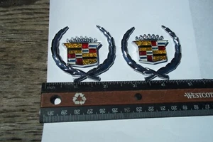 NEW 70s 80s 90s CADILLAC ROOF PANEL CREST WREATH EMBLEM SET 4 PCS.  - Picture 1 of 6