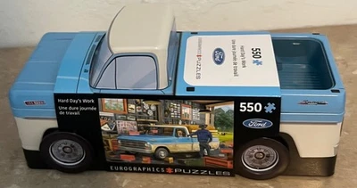 HARD DAY’S WORK 550 PIECE PUZZLE IN COLLECTIBLE TIN BY EUROGRAPHICS - Image 1 of 3