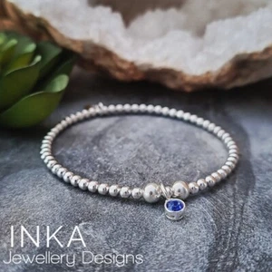 Inka 925 Sterling Silver stretch bead Bracelet with September Birthstone charm - Picture 1 of 7