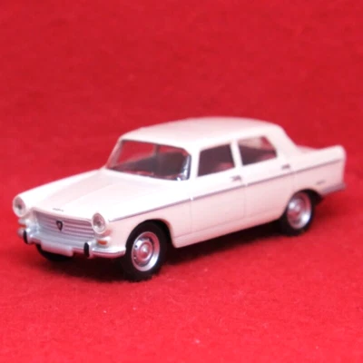 Voiture miniature blanche PEUGEOT 404 NOREV taille 1/58 du Japon F/S - Photo 1/4