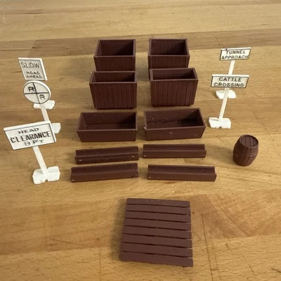 Model Train And Town Signs, Cargo, And Power Pole Lot 17 Pieces - Image 1 of 4