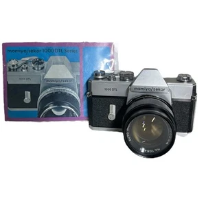Cámara SLR Mamiya Sekor 1000 DTL Vintage 35 mm con lente de 55 mm y manuales funcionando - Imagen 1 de 14