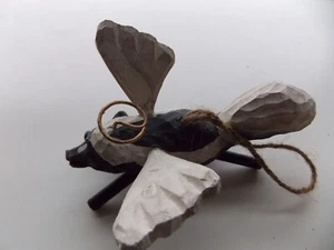 Rustic Wood Skunk Angel Christmas Ornament - Picture 1 of 7