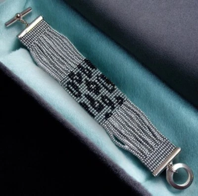 Pulsera Miriam Salat Patrón Leopardo Micro Cuentas Plata y Vidrio Negro Cuentas Foto 1 de 4