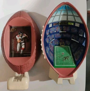 Art sculpture of a miniature football stadium inside of a half cut football - Picture 1 of 4