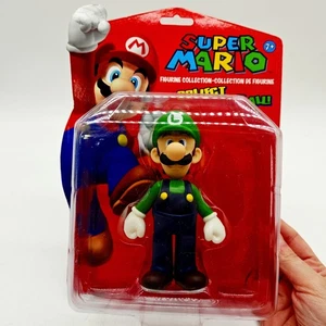 SUPER MARIO "LUIGI" 5 inch FIGURINE COLLECTION NINTENDO 2009 MOC ACTION FIGURE - Picture 1 of 9