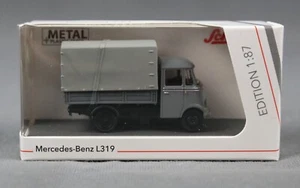 SCHUCO 452661600 /266 1600  (H0, 1:87) Mercedes L 319 Pritsche Plane grau NEU! - Picture 1 of 3