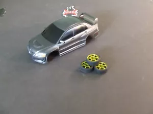 XMODS CARROZZERIA MITSUBISHI LANCER USATA 2004 CON CLIP ANTERIORI E POSTERIORI E RUOTE E PNEUMATICI*C - Foto 1 di 6