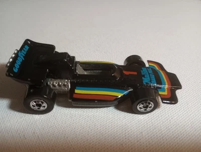 Hot Wheels Goodyear Malibu Grand Prix 1973 coche de carreras Fórmula 1 negro 5 velocidades cromo  Foto 1 de 4
