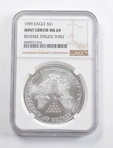 Mint Error MS69 1999 American Silver Eagle REV Struck Thru NGC *3402 - Picture 1 of 3