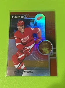 2022-23 UD Synergy Bounty Red Scratched Code #1 Moritz Seider Detroit Red Wings - Picture 1 of 2