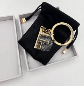 TOM FORD GOLD TF KEYCHAIN / BAG CHARM %100 AUTHENTIC with pouch, boxed Brand New - Picture 1 of 4