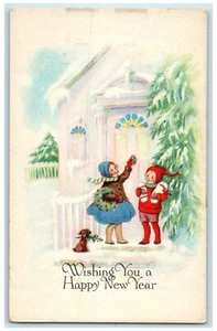 c1910 Neujahr Kinder klopfen Tür Hund Stechpalme Beeren antike Postkarte - Bild 1 von 2