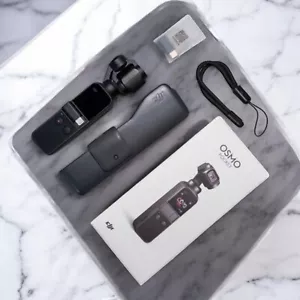 DJI Osmo Pocket 1 (3-Achsen Gimbal) 4K Handkamera First Gen mit Box getestet - Bild 1 von 3