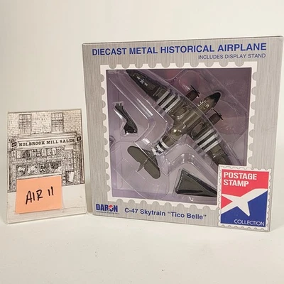 Daron Postage Stamp Collection • C-46 Skytrain "Tice Belle“ ( DC-3 ) • 1:144 - Image 1 of 4