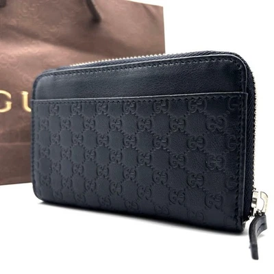 Monedero Gucci Micro Shima Cuero GG Azul Marino Oscuro Usado Buen Estado Foto 1 de 4