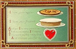 Postal del Día de San Valentín Rebus pastel de manzana y pastel esmerilado plomo al corazón - Imagen 1 de 3