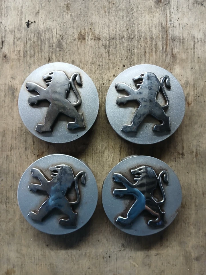 Juego de 4 Tapacubos Centrales Llantas Aleación Original Peugeot 206 207 307 1007 308 2008 3008. Foto 1 de 2