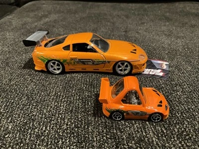 Jada Fast & Furious Pull And Go Toyota Supra 1/32 Scale & Hot Wheels Supra - Image 1 of 4