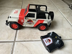 Jada Jurassic Park Jeep Wrangler JP18 Telecomando Auto 2014 1:16 RC - Foto 1 di 3
