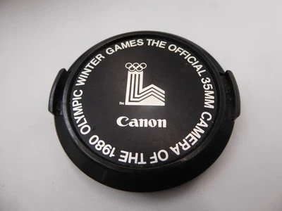 Canon genuine 35mm Camera of the 1980 Winter Olympic Games' C-52mm Lens Cap - Image 1 of 2