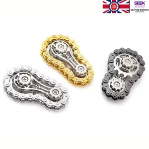 1X Rodillo Inquieto Bicicleta Cadena Dedo Juguete Alivio del Estrés Ansiedad Cadena Rodillo de Mano - Imagen 1 de 9