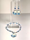 Handcrafted Blue, Ab Crystal And Pearl Hello Kitty Bracelet And Earring Set.