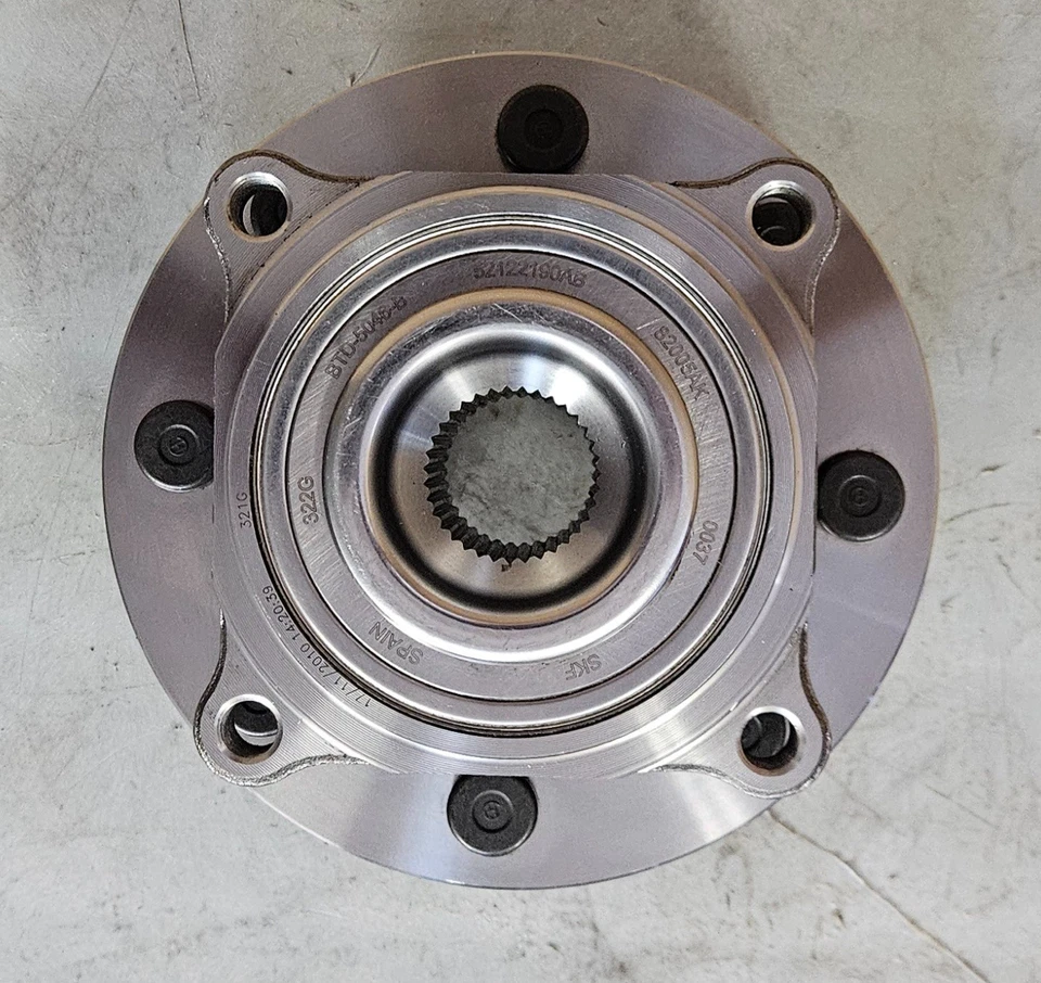 Conjunto de buje de eje GENUINO Mopar 52122190AB - Conjunto de cojinete de rueda y buje - Delantero Foto 1 de 4