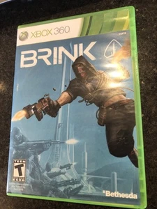BRINK X-BOX XBOX 360 DISCO JUEGO, MANUAL Y FUNDA NES HQ - Imagen 1 de 2