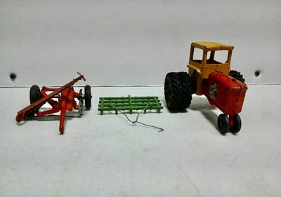 Vintage Slik Toys tractor with cab, sickle bar mower and spike harrow. No box. - Image 1 of 4