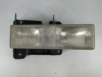 Lámpara de faros delanteros derecha OEM para pasajero camioneta Chevrolet EG5YX Foto 1 de 4