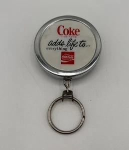 VTG Coke Retractable Keychain Metal ‘Adds Life To Everything’ Barlow USA ‘76-‘79 - Picture 1 of 7