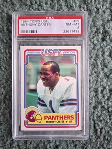 Juego de fútbol americano 1984 Topps USFL Anthony Carter RC #59 PSA 8 casi nuevo-como nuevo, ¡novato! **RARO** - Imagen 1 de 2