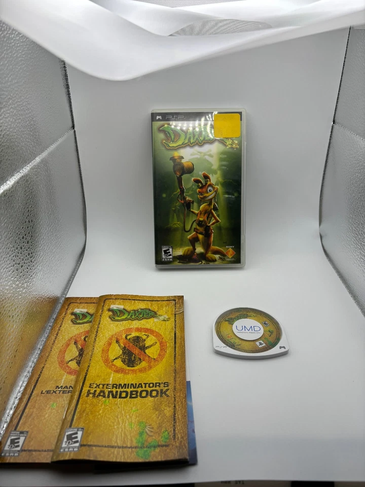 Daxter Sony PlayStation Portátil PSP Completo CIB con Manual Etiqueta Negra - Probado Foto 1 de 3