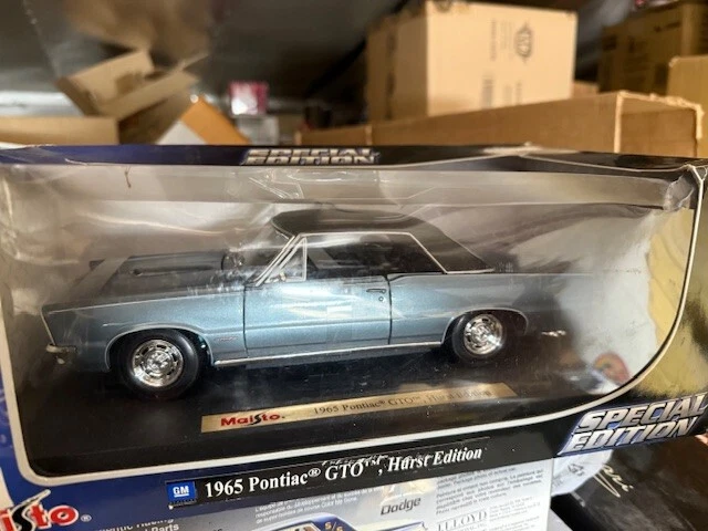 1.18 1965 Pontiac GTO HURST EDICIÓN MAISTO MODELOS DIECAST Foto 1 de 3