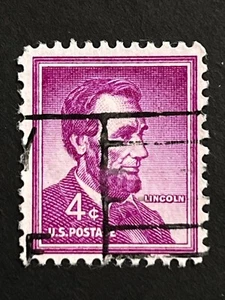 Estampilla postal vintage de 4 centavos de Abraham Lincoln púrpura oscuro coleccionable - Imagen 1 de 3