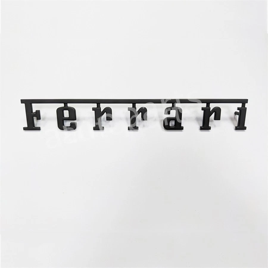 Script trasero Ferrari 360 F430 458 488 F12 812 308 328 emblema negro mate 61025000 Foto 1 de 4