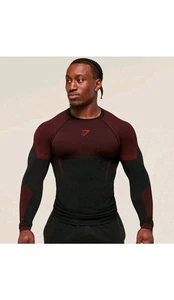 Gymshark Onyx 5.0 Seamless Langarm T-Shirt schwarz/karminrot Gr. M  - Bild 1 von 1